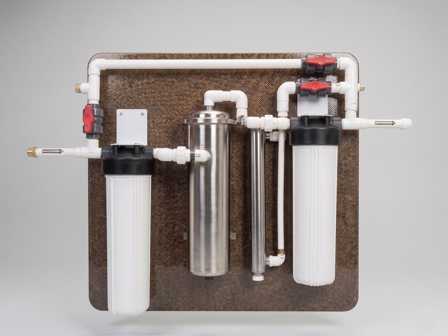 Water filtration system with multiple cylindrical filters on a gray background